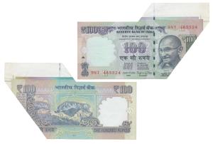 Rupees 100, signed Raghuram Rajan, Error, margin with extra paper on top right corner and 